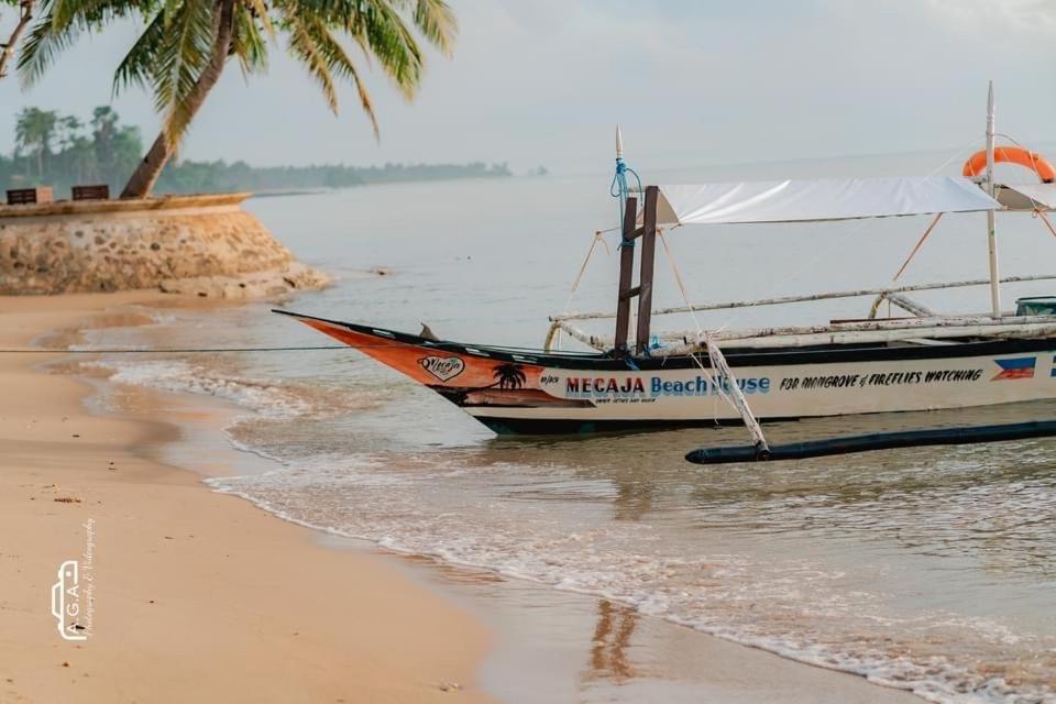 Отель Mecaja Beach House Roxas  Экстерьер фото